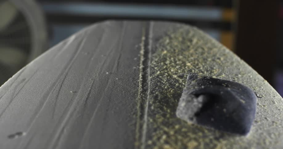 A surfboard being shaped