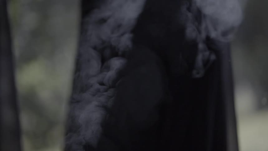 Smoke billowing from a window