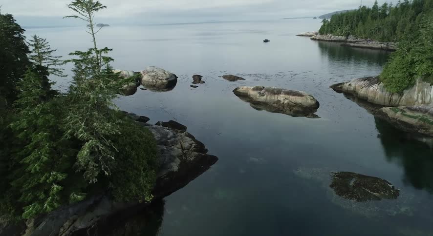 An aerial view of a lake and rocks