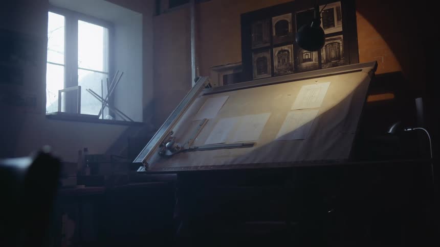 Sunlight shining onto a board with papers indoors