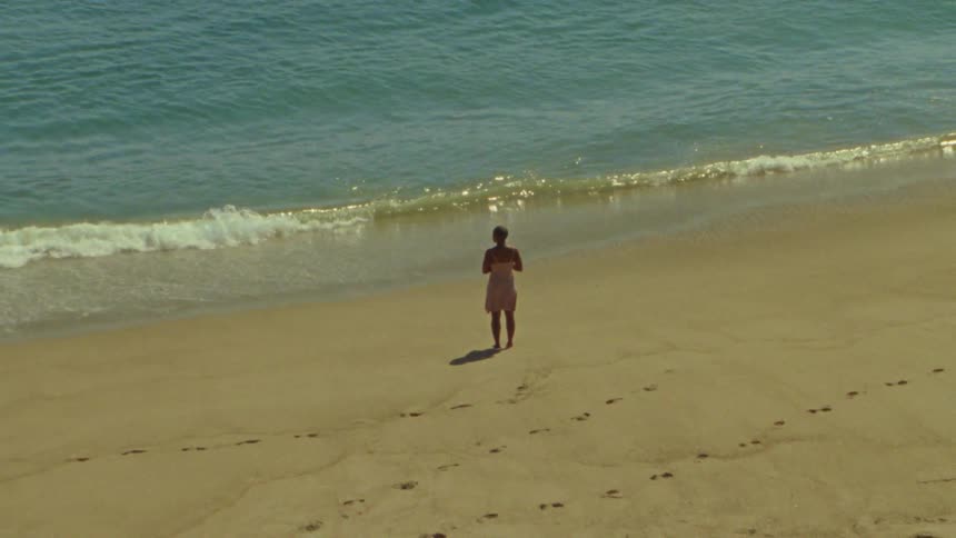 Woman standing on beach