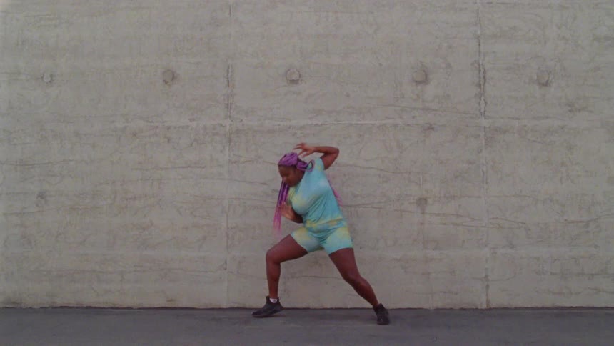 A woman dancing outside