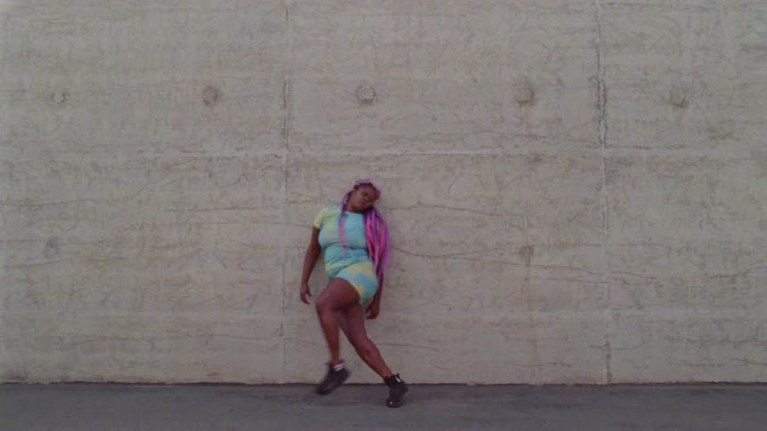 A woman that is dancing outside