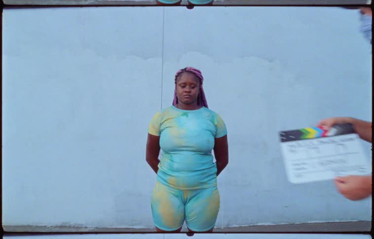Woman standing facing camera
