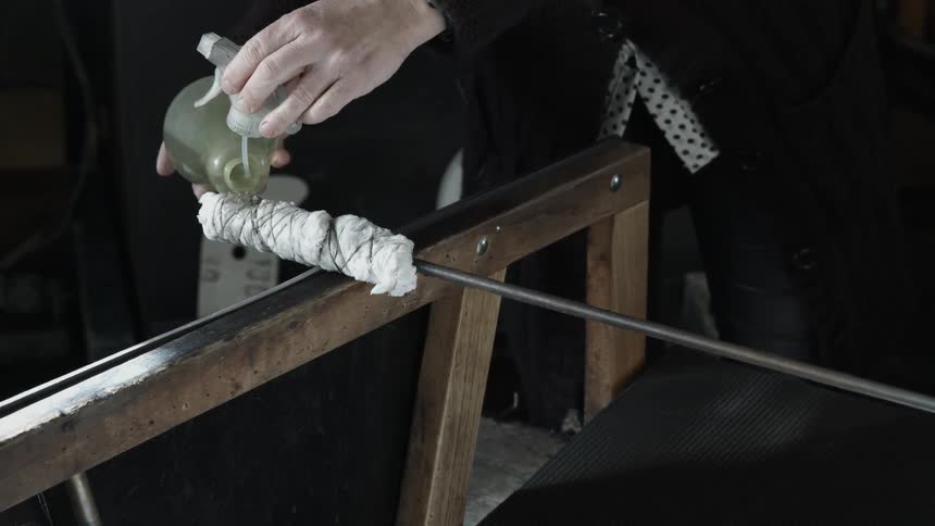 Flammable liquid if poured on a cloth at the end of a rod
