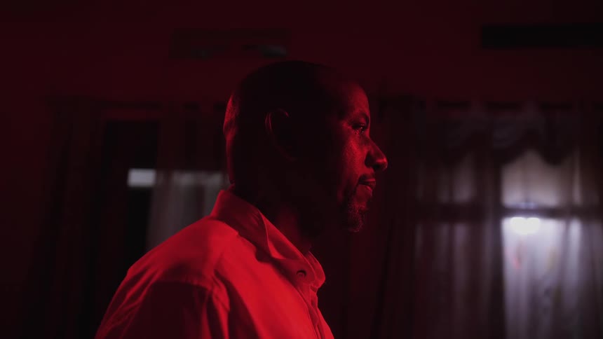 Black male standing still