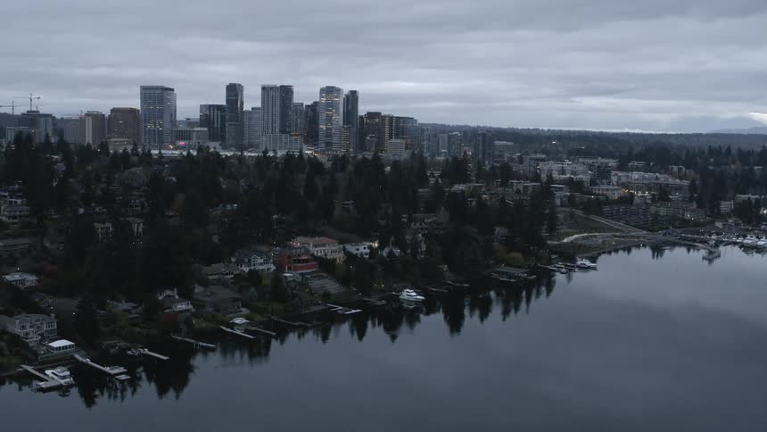 Beautiful homes line the shoreline of a bayside neighborhood near Bellevue Washington