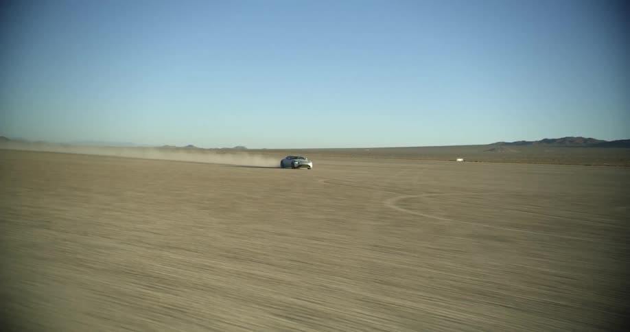 Car driving in desert