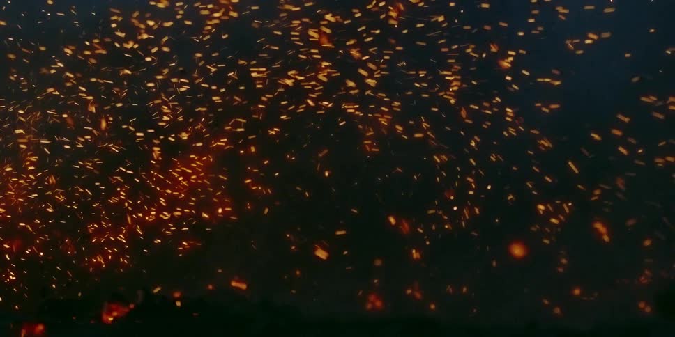 Mountain biker kicks up flying embers