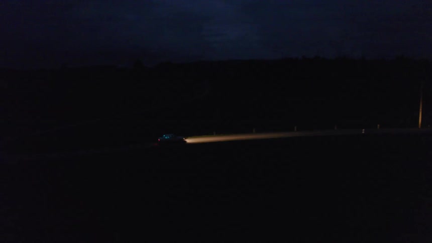 Car driving on country road