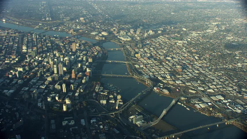 High altitude aerial of Portland Oregon and the Willamette River as seen looking to the south east in this aerial shot