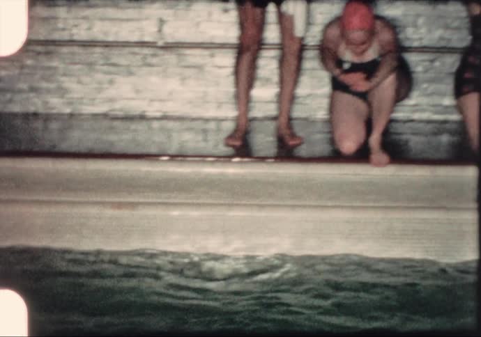 Women practice diving during the 1960's