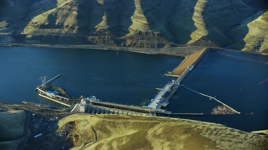 Sweeping aerial of Lower Monumental Dam on the Lower Snake River near Pullman Washington and Eastern Washington University