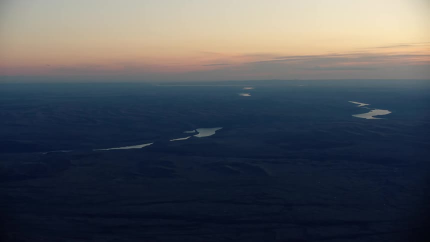 Super wide blue hour post sunset glow of the Lower Sanke River as it meanders west to the Columbia River