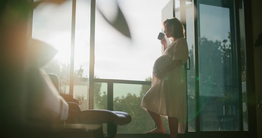 Pregnant woman drinking