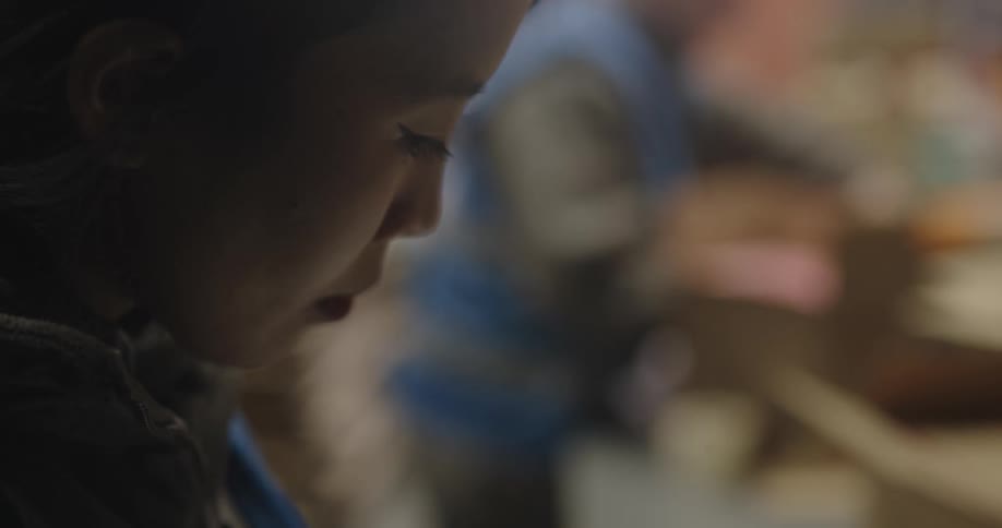 Female worker checking inventory on a warehouse