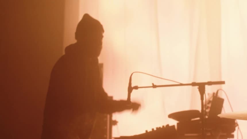 Musicians play and perform on a set designed for filming