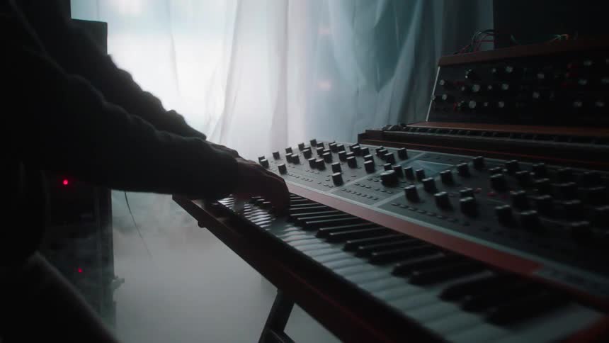 Man playing instruments as a dj