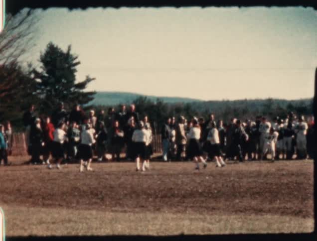 A group of people playing sports