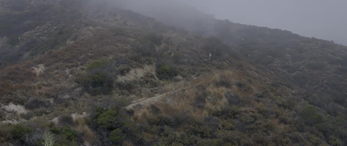 Man Running Up Hill