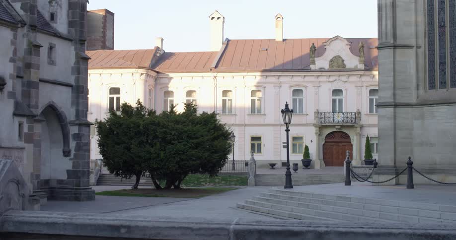 The town square is empty on a sunny day