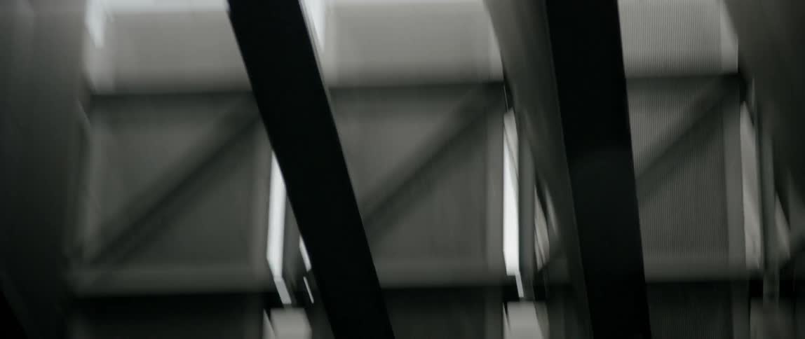 Moving under a metal roof with beams