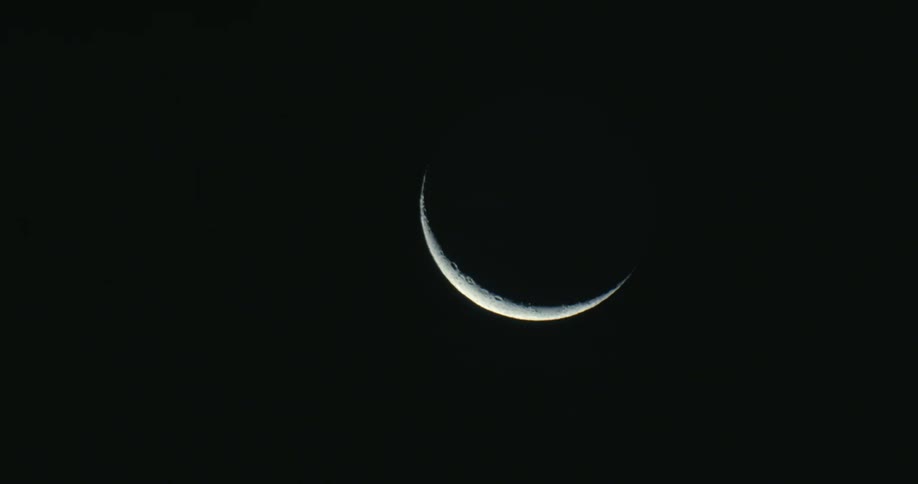 The crescent moon is shining the sky