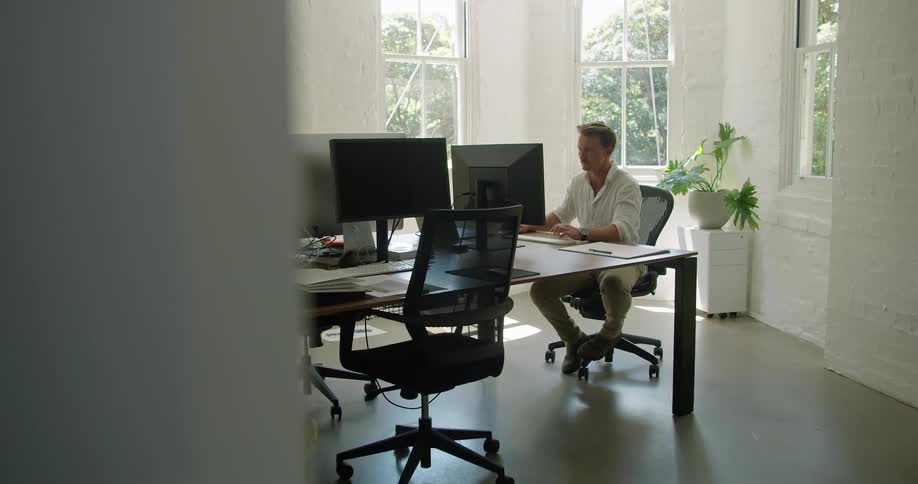 An employee working at a computer