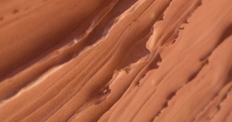 A brown material with cracks and ridges
