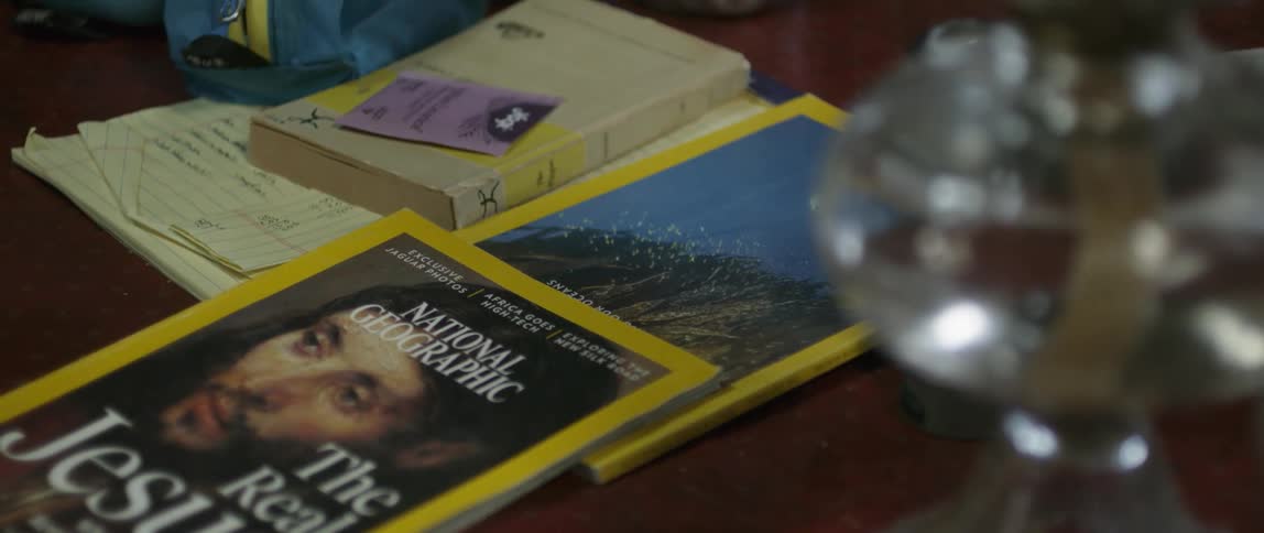 Man In Mountain Log Cabins During Winter
