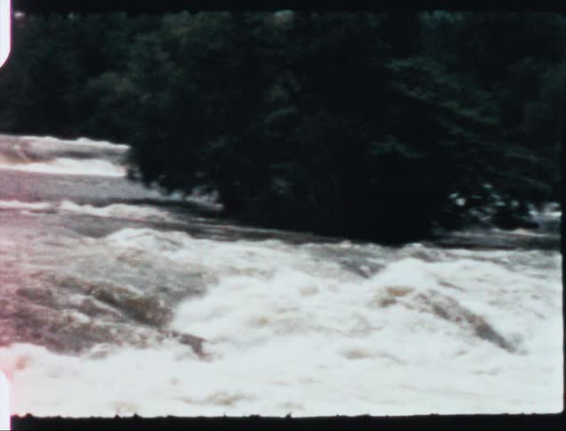 Turbulent waters in the river rapids caught on vintage film