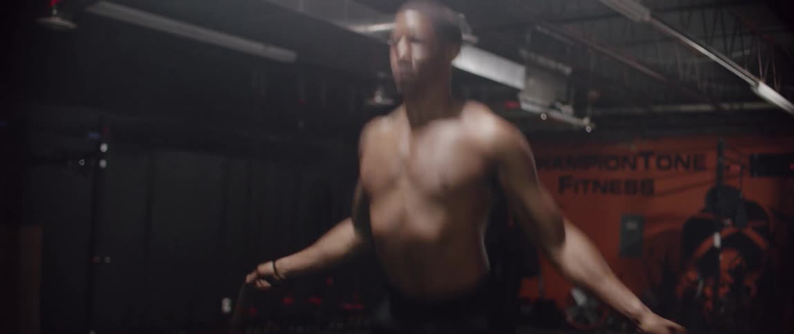 A man jumps rope in the gym