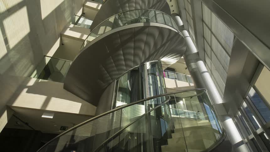 A spiral staircase inside a large building