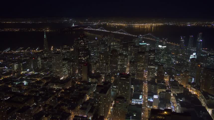 The city is brightly lit at night