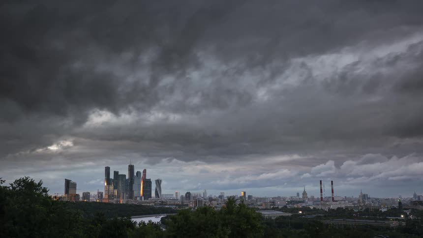 Storm clouds moving over a city