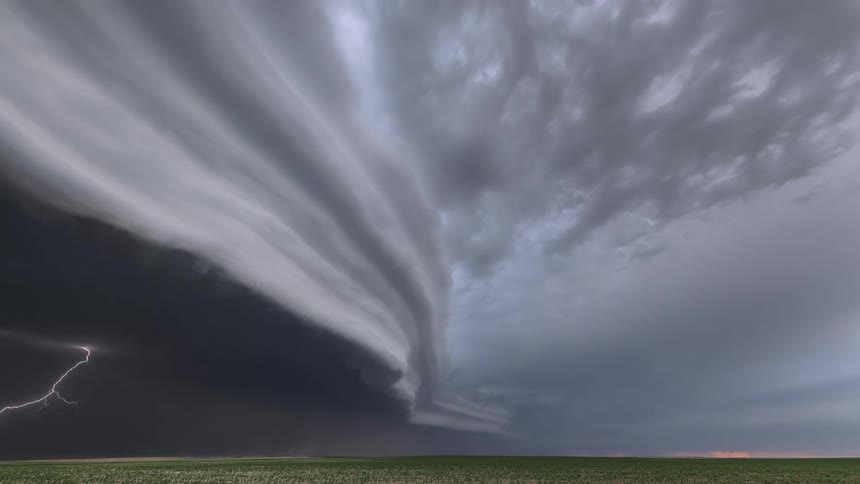 A landscape with lightning storms with the sky and clouds in the background