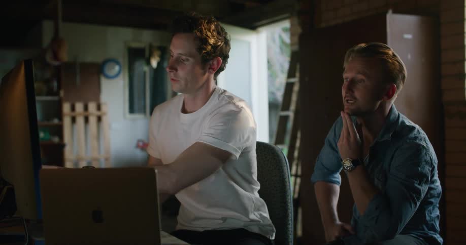 Colleagues brainstorming on a project on a computer screen