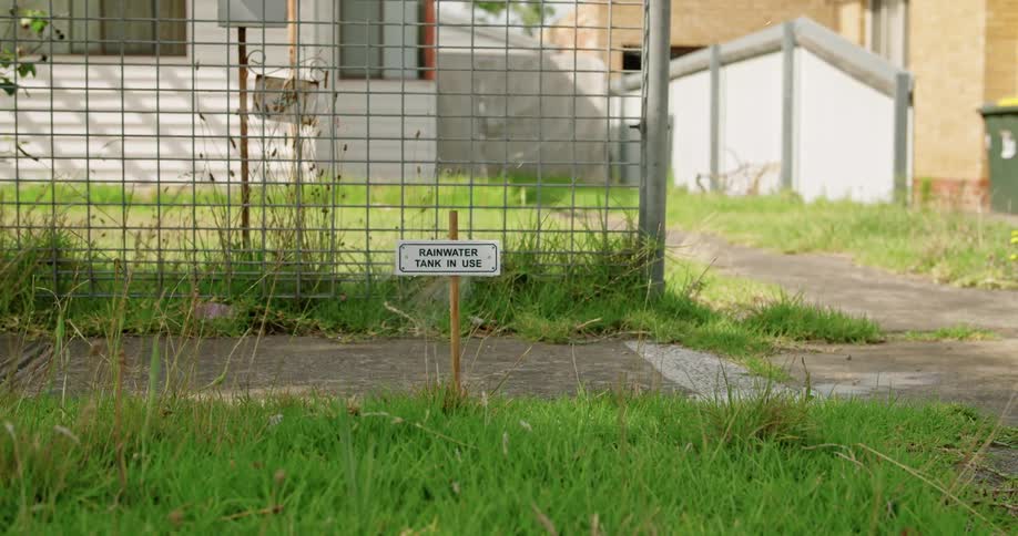 Water from rainwater tank is used to water lawn