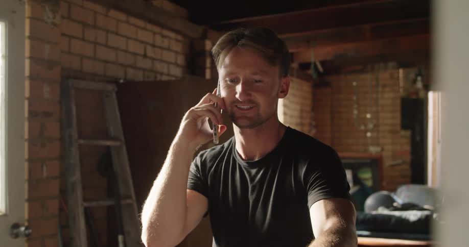 A man is talking on his cellphone