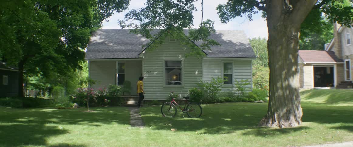 A man makes a delivery on a bicycle