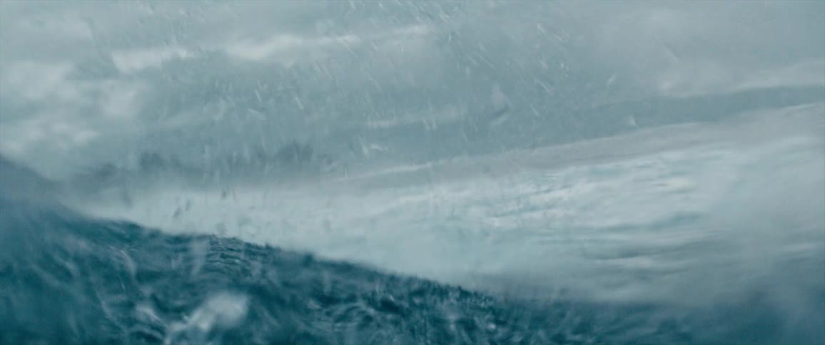 Ocean waves rise and fall during a storm