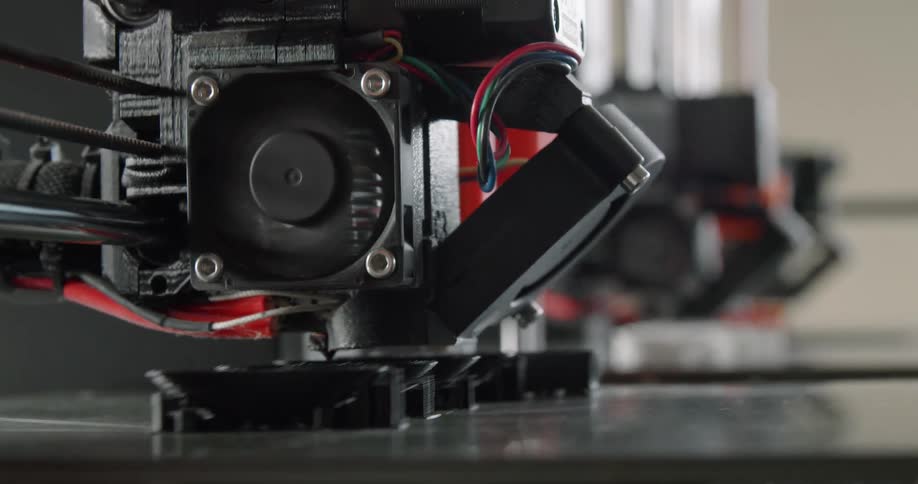 A view of 3d printers making plastic pieces