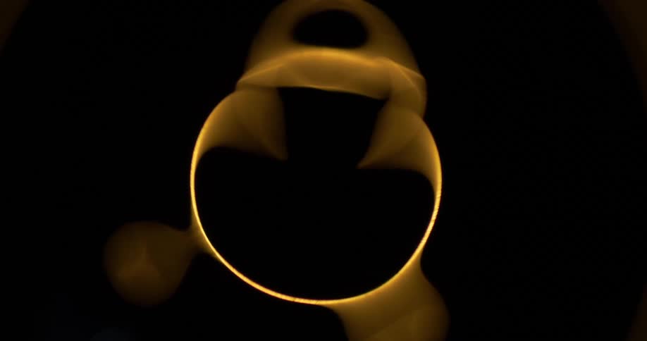 Out of focus golden ring of reflected light