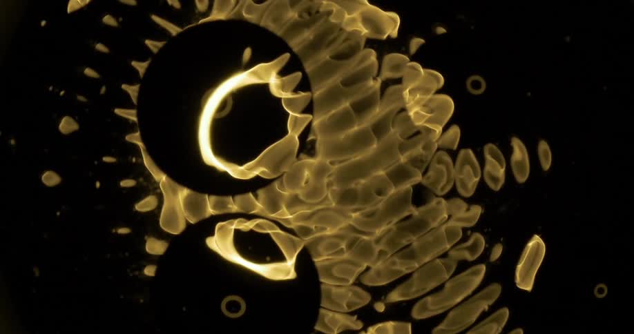 Pulsing yellow lights on a black background