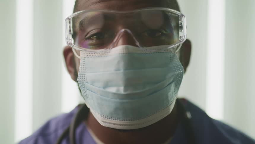 A doctor standing in a room