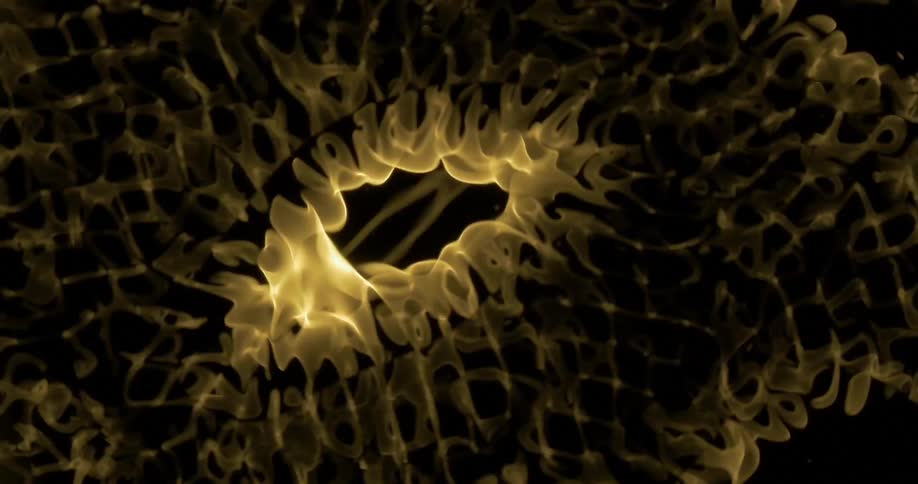 Vibrating liquid shimmering with yellow lights