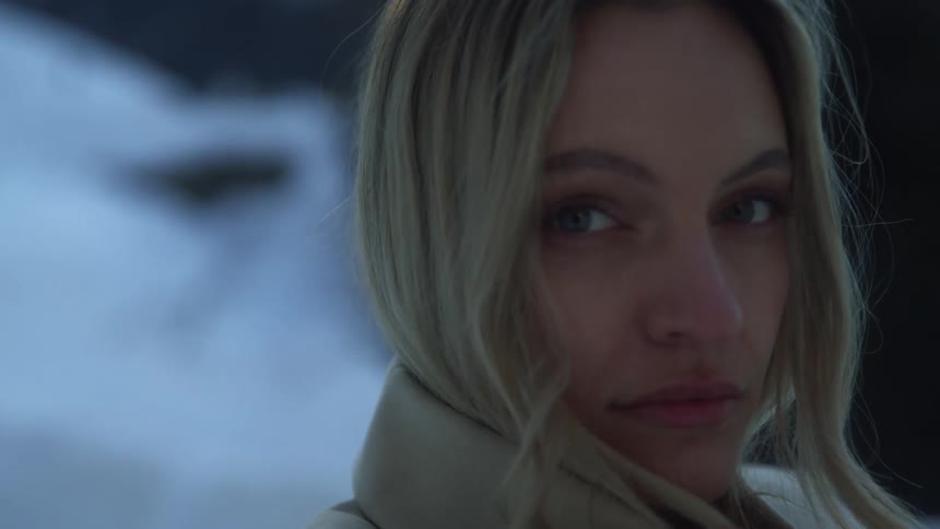 A woman standing outside during winter