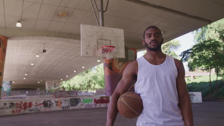 A man holding a basketball