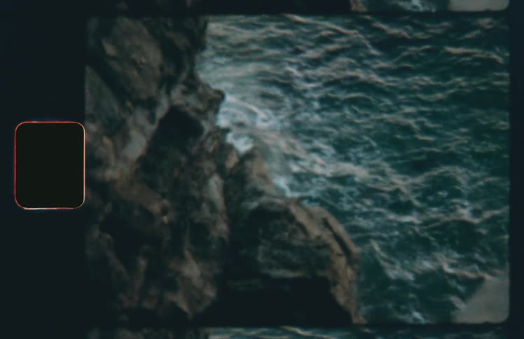 Ocean waves crash upon a rocky coast