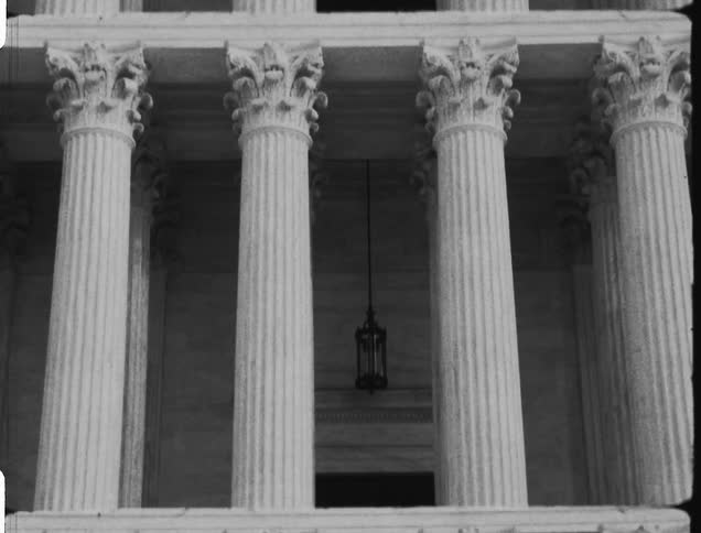 The intricately carved facade of the united states supreme court building during the day